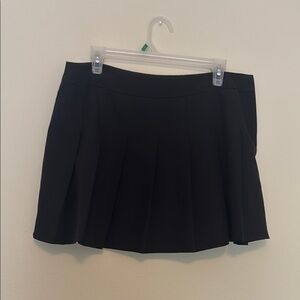 Black pleated skirt with built in shorts